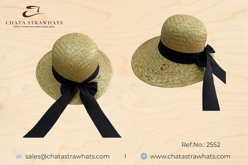Handwoven ladies’ straw hat with wide brim and elegant black ribbon