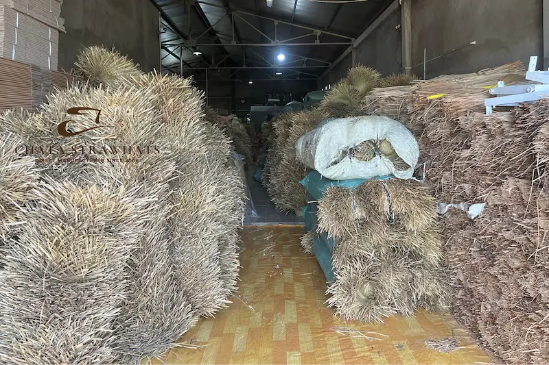 Raw seagrass and rush materials stored at Chata's Vietnam straw hat factory